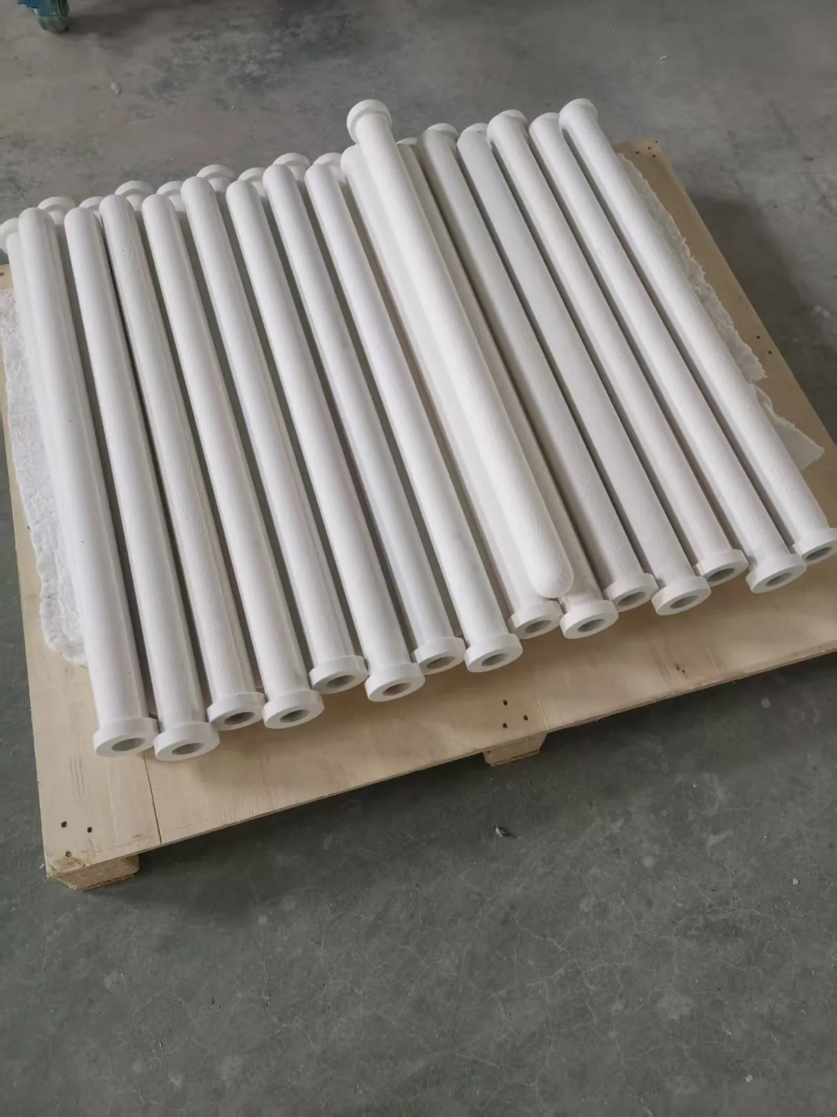 Foam-packed ceramic filter tubes in an export wooden crate