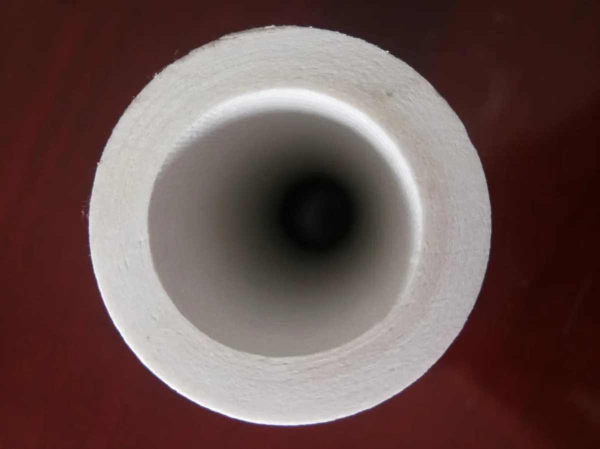 Open end of a ceramic fiber filter tube showing the 20 mm wall thickness