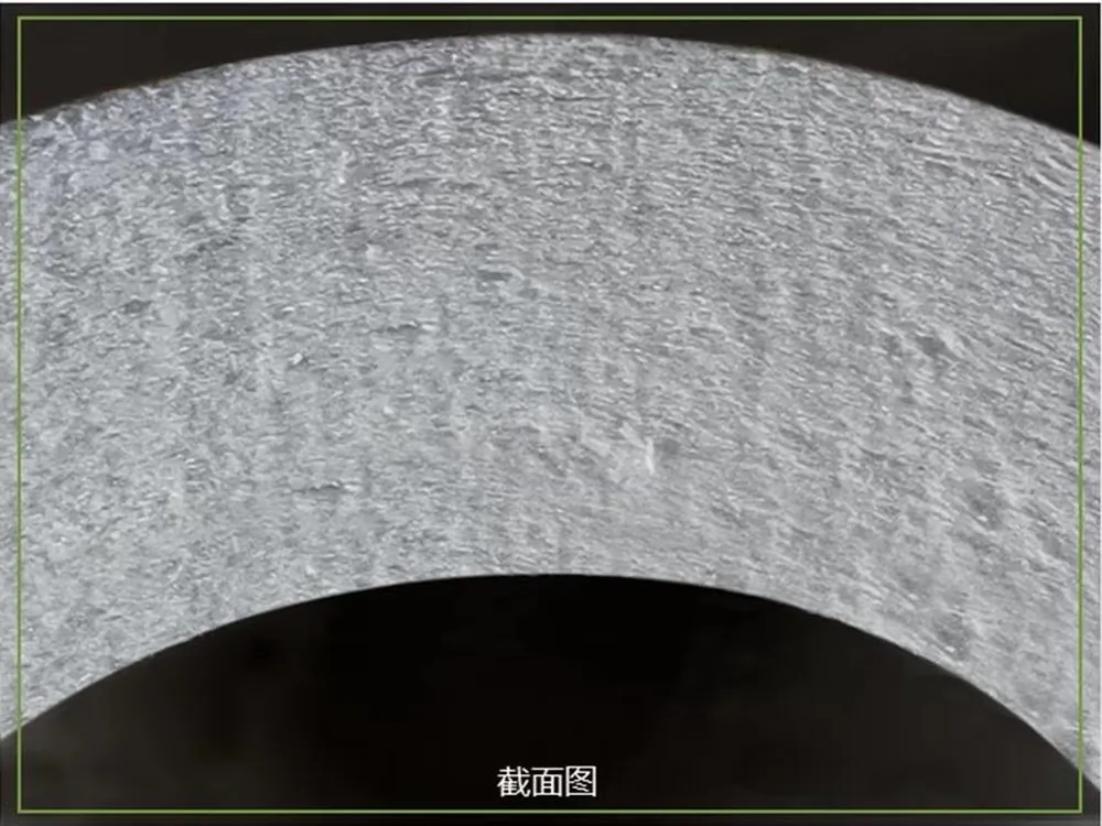 Cross-section of a ceramic fiber filter tube wall showing the porous structure