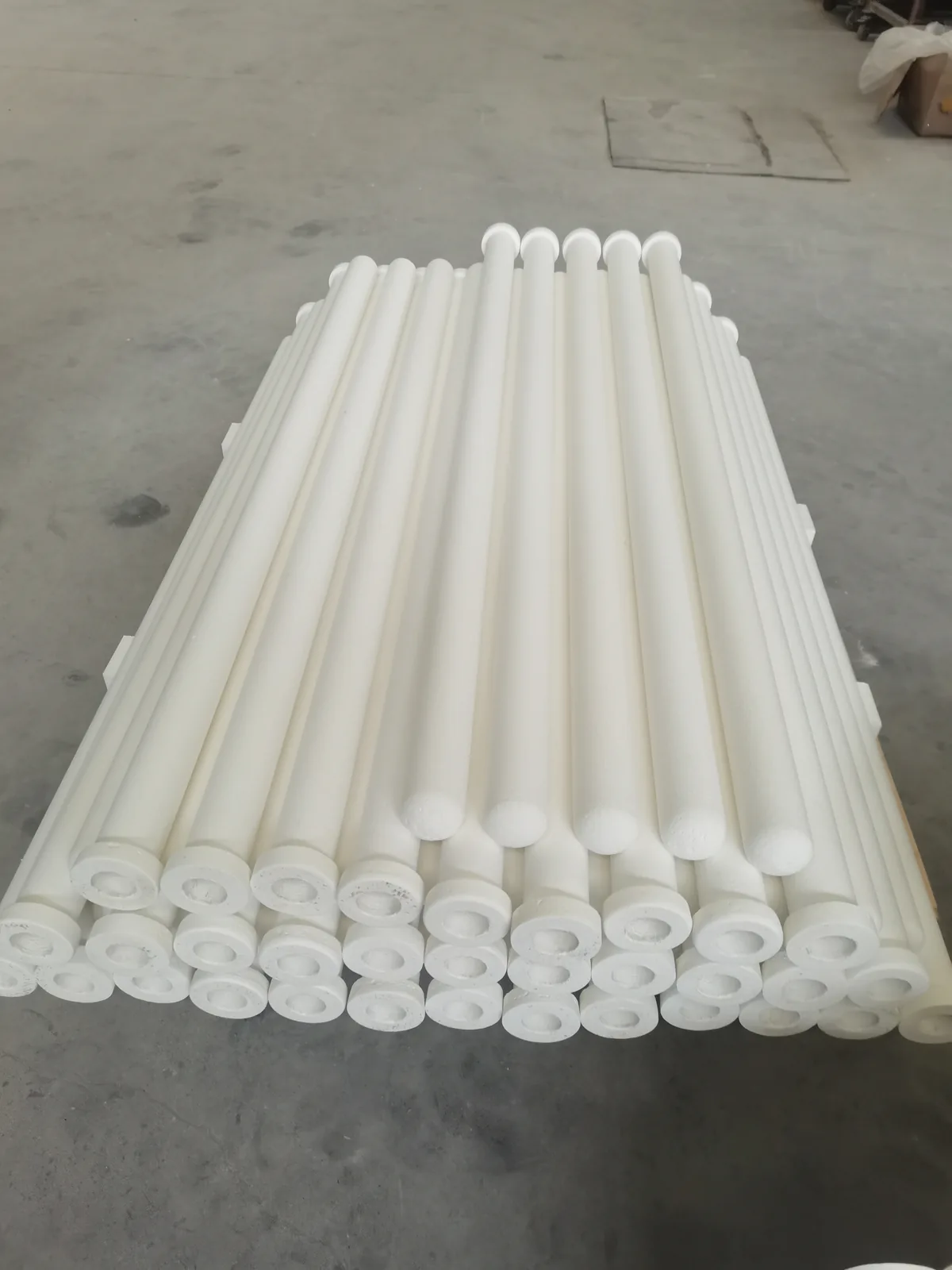 Ceramic fiber filter tubes for hot gas filtration